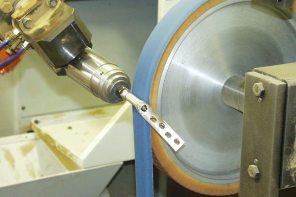 Robotic Abrasive Belt Polishing and Buffing of Orthopedic Implants